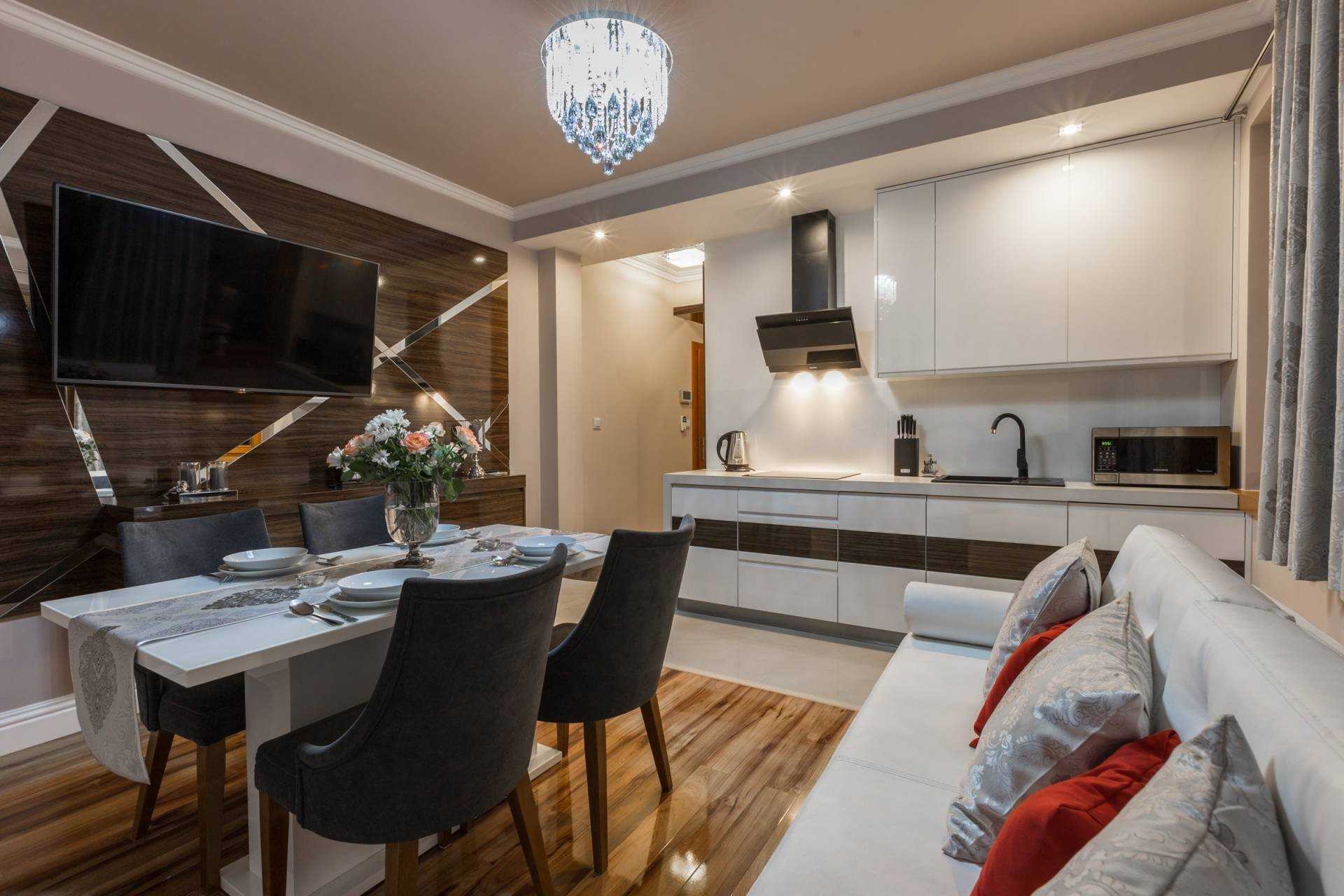 Дизайн кухни гостиной в современном стиле в квартире 15 кв м с диваном фото